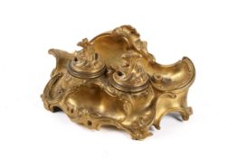 A 19th century French Rococo style ormulu encrier.