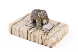 A late 19th/early 20th century novelty desk weight.