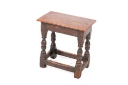 A 19th century oak stool.