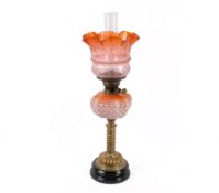 A Victorian brass oil lamp.
