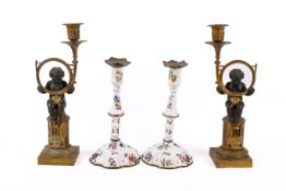 Two pairs of candlesticks.
