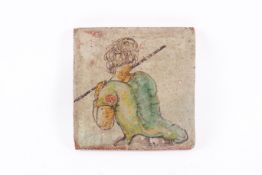 An antique ceramic tile.
