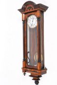 A 19th century Vienna walnut cased wall clock.