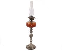 A Victorian silverplated oil lamp.