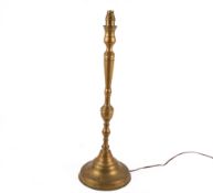 A late 20th century brass candlestick type table lamp.