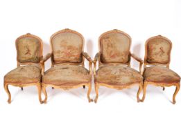 A set of four French style chairs.