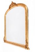 A 20th century overmantel arched top wall mirror.