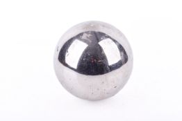 A silvered ornamental sphere. With two holes for fixing, diameter circa 21cm.