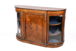 A Victorian burr walnut bow fronted credenza.