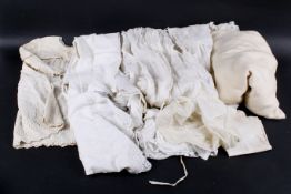 A collection of 19th and 20th century christening gowns and other items.