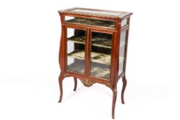 A glazed mahogany display cabinet.