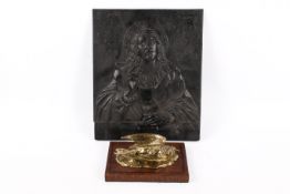 Two cast metal items.
