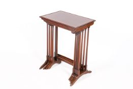 An Edwardian quartetto nest of mahogany inlaid tables.