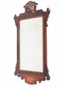 A 19th century fret work bevelled edge wall mirror.