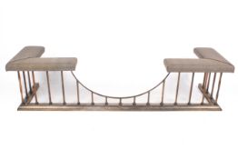 A large Victorian style 20th century fire fender.