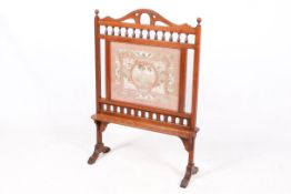 A mahogany firescreen.
