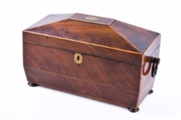 A 19th century mahogany twin-handled sarcophagus shaped tea caddy.