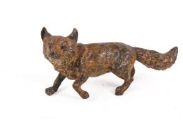 A late 19th/early 20th century Austrian cold painted bronze figure of a fox.