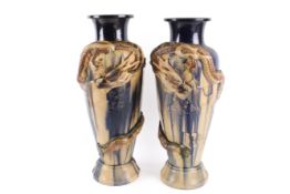 A large pair of Art Nouveau dragon vases.
