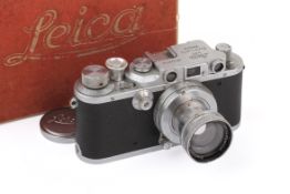 A Leica IIIB 35mm Rangefinder Camera. Chrome. 1939. Serial number 323749.
