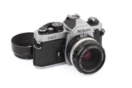 A Nikon FM2N 35mm SLR Camera. Chrome, Serial number 8751068. With a Nikon 50mm f2 Nikkor-H.