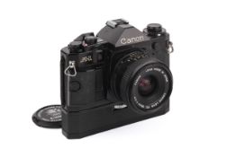A Canon A1 35mm SLR Camera. Black. Serial number 1386660. With a Canon FD 28mm f2.
