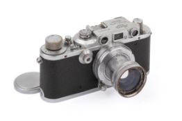 A Leica IIIB 35mm Rangefinder Camera. Chrome, 1938. Serial number 294472.