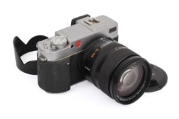 A Leica Digilux 3 Digital SLR Camera. With a 14-150mm f3.5-5.