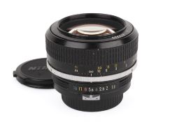 A Nikon 55mm f1.2 Nikkor Non-AI F mount camera lens. Serial number 377330. Functions well. Fungus.