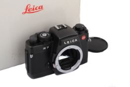 A Leica R7 35mm SLR Camera Body. Black, 1992. Serial number 1922348.
