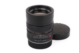 A Leitz 90mm f2.8 Elmarit-R lens. Serial number 2110782. With front and rear caps.