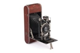A Zeiss Ikon Luxus Cocarette II Folding Camera. With a Carl Zeiss Jena 12cm f4.