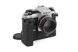 A Nikon FA 35mm SLR Camera. Chrome, Serial number 5088679. With a Nikon 50mm f1.