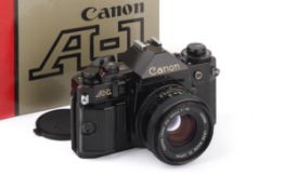 A Canon A1 35mm SLR Camera. Black. Serial number 1786632. With a Canon FD 50mm f1.