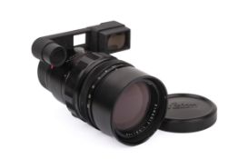 A Leitz Canada 135mm f2.8 Elmarit lens. Leica M mount. Black. Serial number 2064170. With both caps.