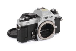 A Nikon FA 35mm SLR Camera Body. Chrome. Serial number 5087536. Untested.