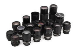 A Collection of Nikon F-mount AI lenses. To include a Nikkor 135mm f2.8, a Nikkor Zoom 35-105mm f3.