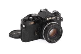A Nikon FM2N 35mm SLR Camera. Black, Serial number 8549412. With a Nikon 50mm f1.8 Nikkor lens.