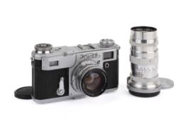 A Kiev IIA 35mm Rangefinder Camera Outfit. Chrome. Serial number A 511550.