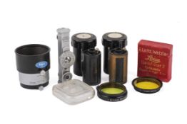 A small collection of Leitz accessories.