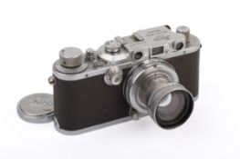 A Leica III Mod F 35mm Rangefinder Camera. Chrome. 1938. Serial number 276371.