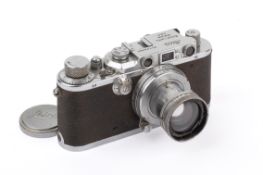 A Leica III Mod F 35mm Rangefinder Camera. Bright/'Sunny' Chrome. 1934. Serial number 129991.