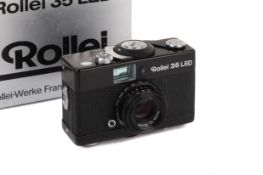 A Rollei 35 LED 35mm Viewfinder Camera. Black. 'Made in Singapore'. With a Rollei 40mm f3.