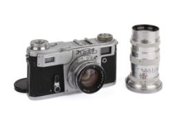A Kiev 4A 35mm Rangefinder Camera Outfit. Chrome. Serial number B 7623909.