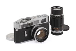A Canon Model 7 35mm Rangefinder Camera Outfit. Chrome, Serial number 864469.