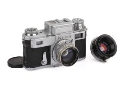 A Kiev III 35mm Rangefinder Camera Outfit. Chrome. Serial number B 545152.
