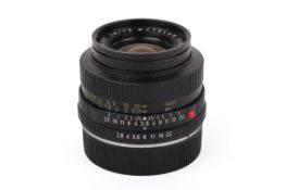 A Leitz 30mm f2.8 Elmarit-R lens. Serial number 2170446. Leica R mount. With rear cap.