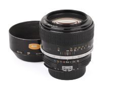 A Nikon F-mount AI 85mm f1.8 Nikkor lens. Serial number 415133.