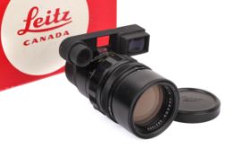 A Leitz Canada 135mm f2.8 Elmarit lens. Leica M mount. Black. Serial number 2621608.