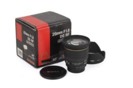 A Sigma 20mm f1.8 DG RF Auto Focus lens. Nikon F mount. With makers box.